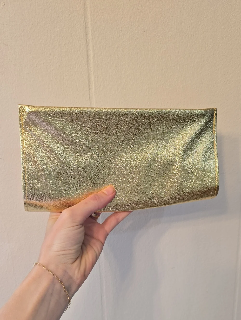 Mid-Century Metallic Leather Clutch Bag. Logo 